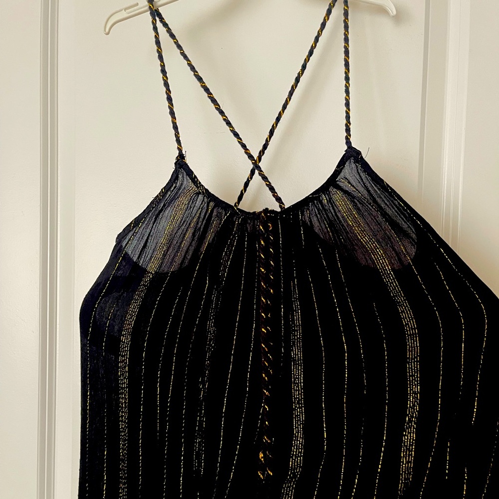 Cute summer tank; easily go day to night. Size small.